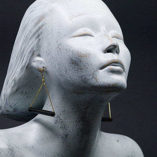 Black and Golden Triunghiular Paper Earrings on Model Back to Black Collection Chiramo Paper Jewelry
