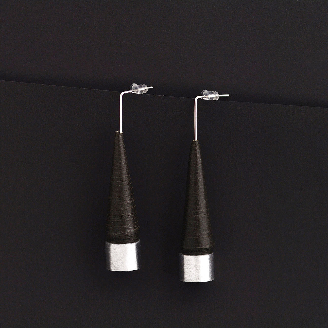 Black cone earrings with silver foil